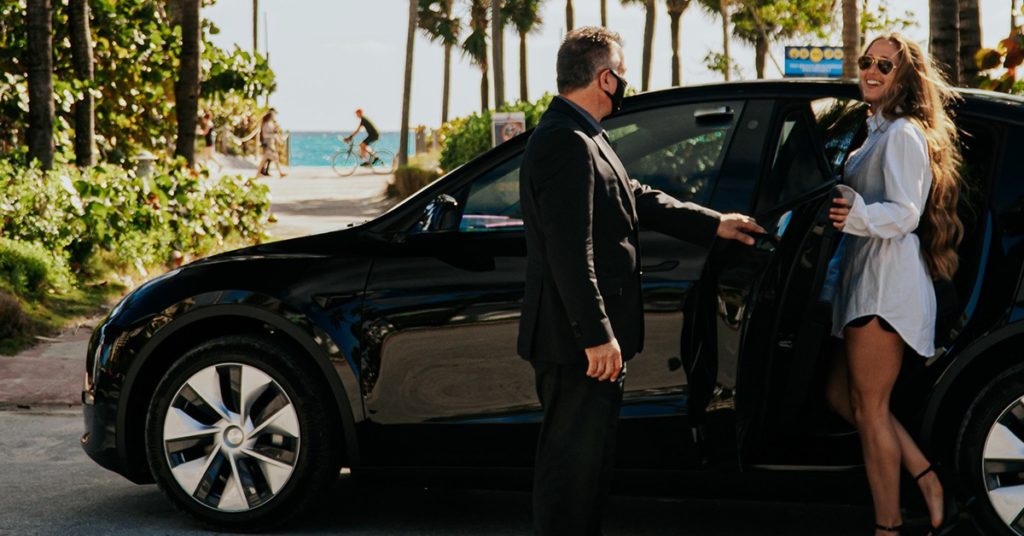 Presidential Limo picking up a guest with private car service in Palm Beach.